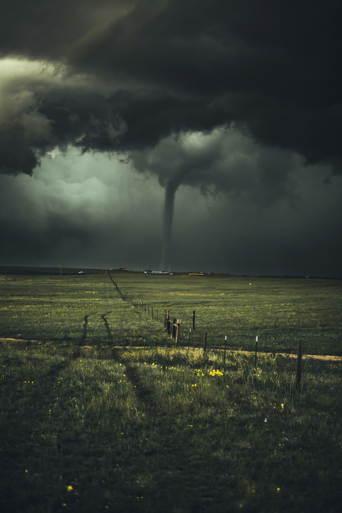 Dramatic storm clouds over open landscape